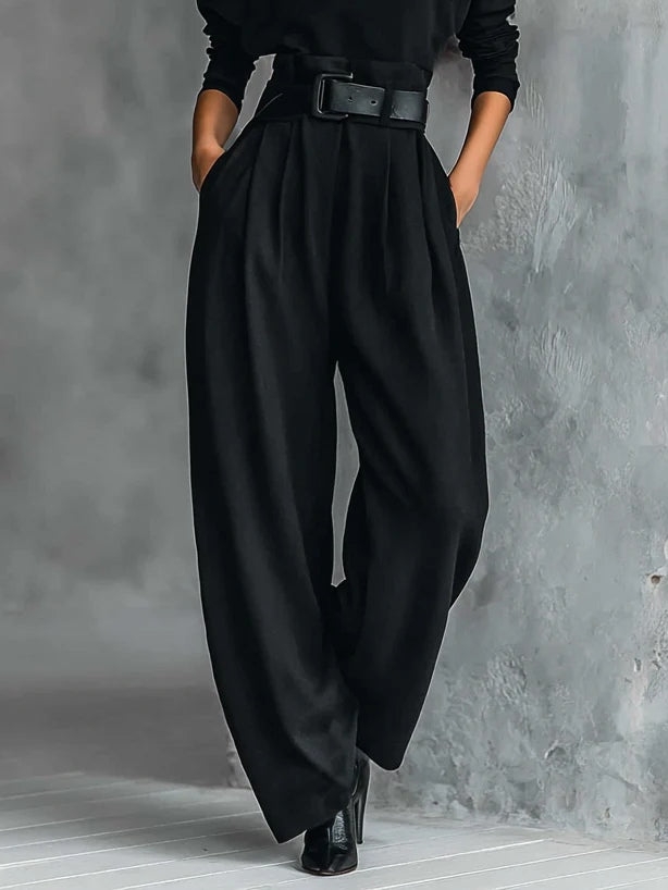 Women's black long-sleeve turtleneck and tailored trouser set