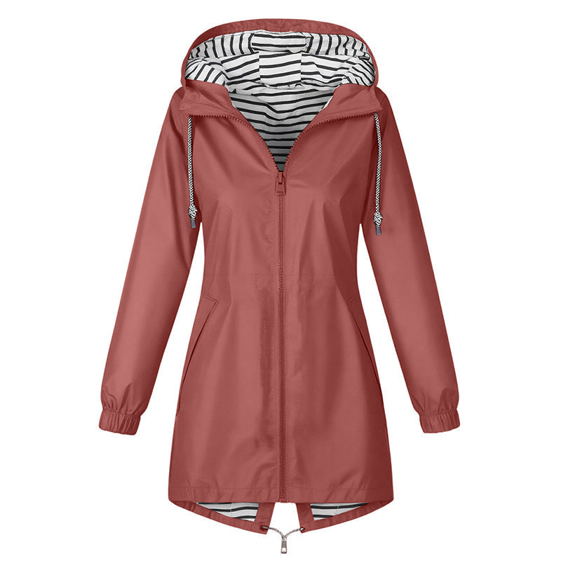 Rouge hooded rain jacket with striped lining on a white background