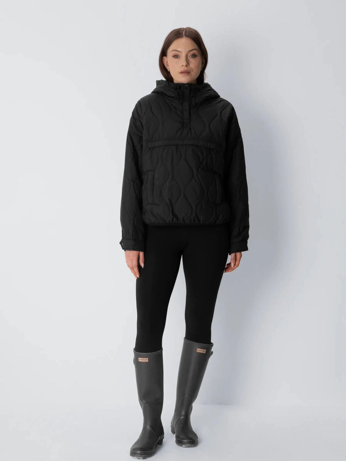 Unisex packable quilted puffer hoodie in black