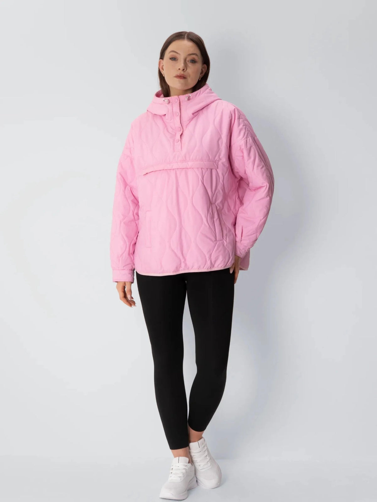 Unisex packable quilted puffer hoodie in morganite pink