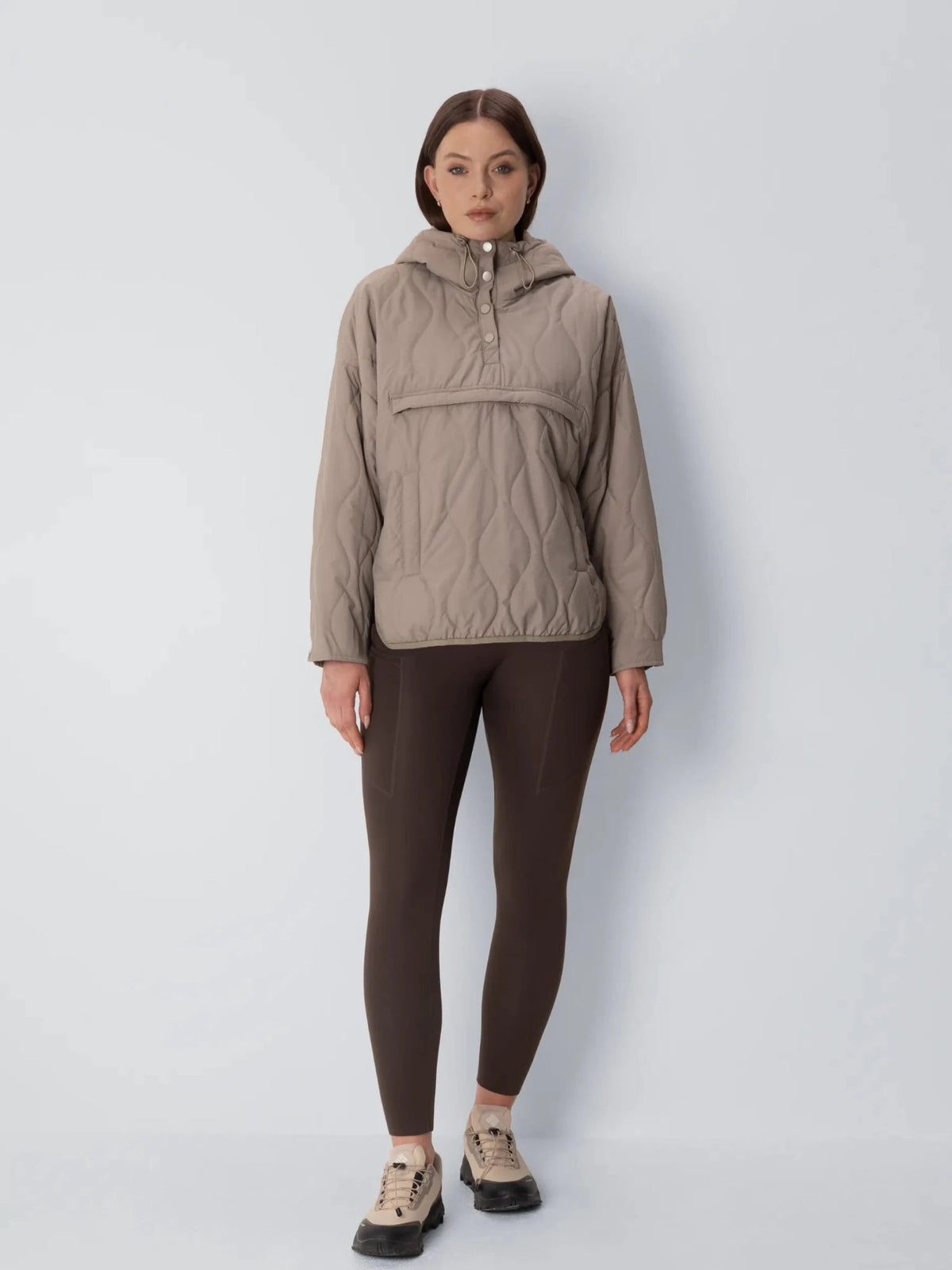 Unisex packable quilted puffer hoodie in dark taupe